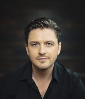 A head shot of Samuel Hasselhorn who is looking directly into the camera.
