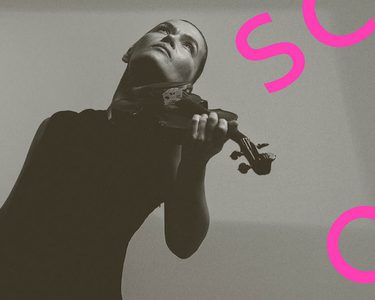 Mari Samuelson holds the violin and wears a long black dress.