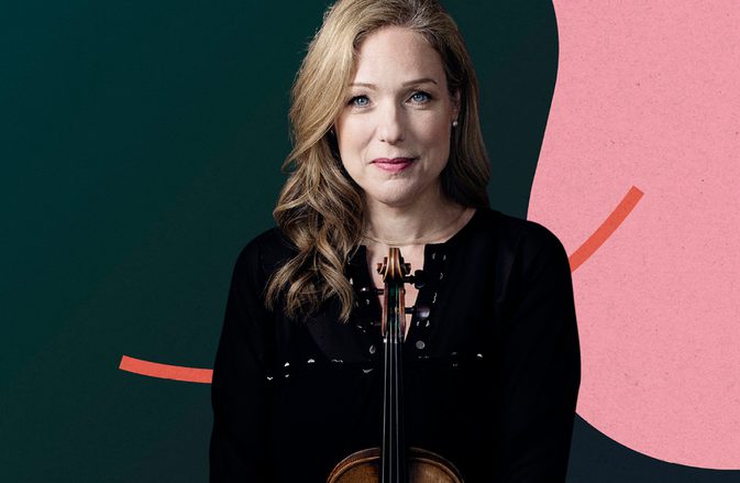 Violinist Isabelle van Keulen smiling at the camera, holding her instrument, against a dark background with light blue and pink shapes.