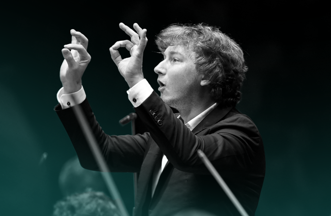 Maxim conducts the Orchestra