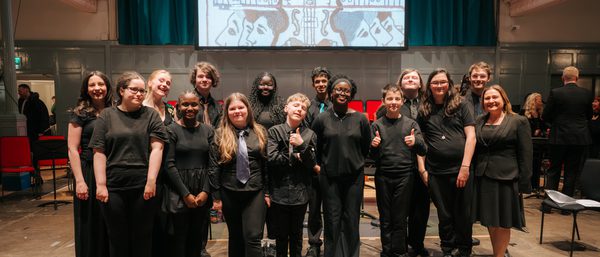 Castlebrae voices pose for a pciture and smile.