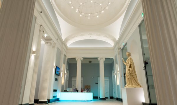 The entrance hall of Aberdeen Music Hall, with a statue of Queen Victoria on the right, and the box office in the background.