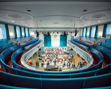 The view of the stage in the Queen's Hall from the back of the gallery during a rehearsal.