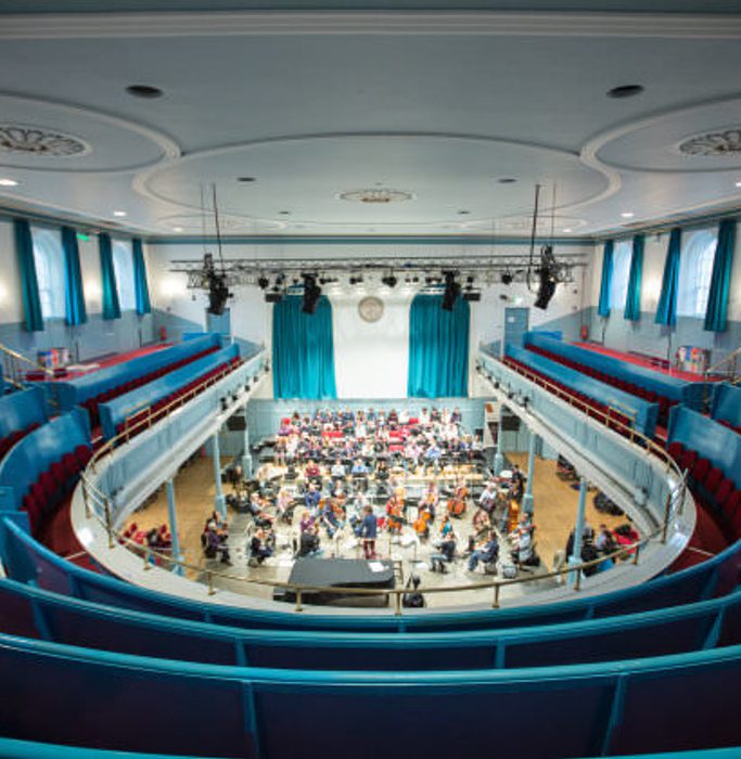 The view of the stage in the Queen's Hall from the back of the gallery during a rehearsal.
